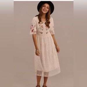 Half sleeved embroidered dress